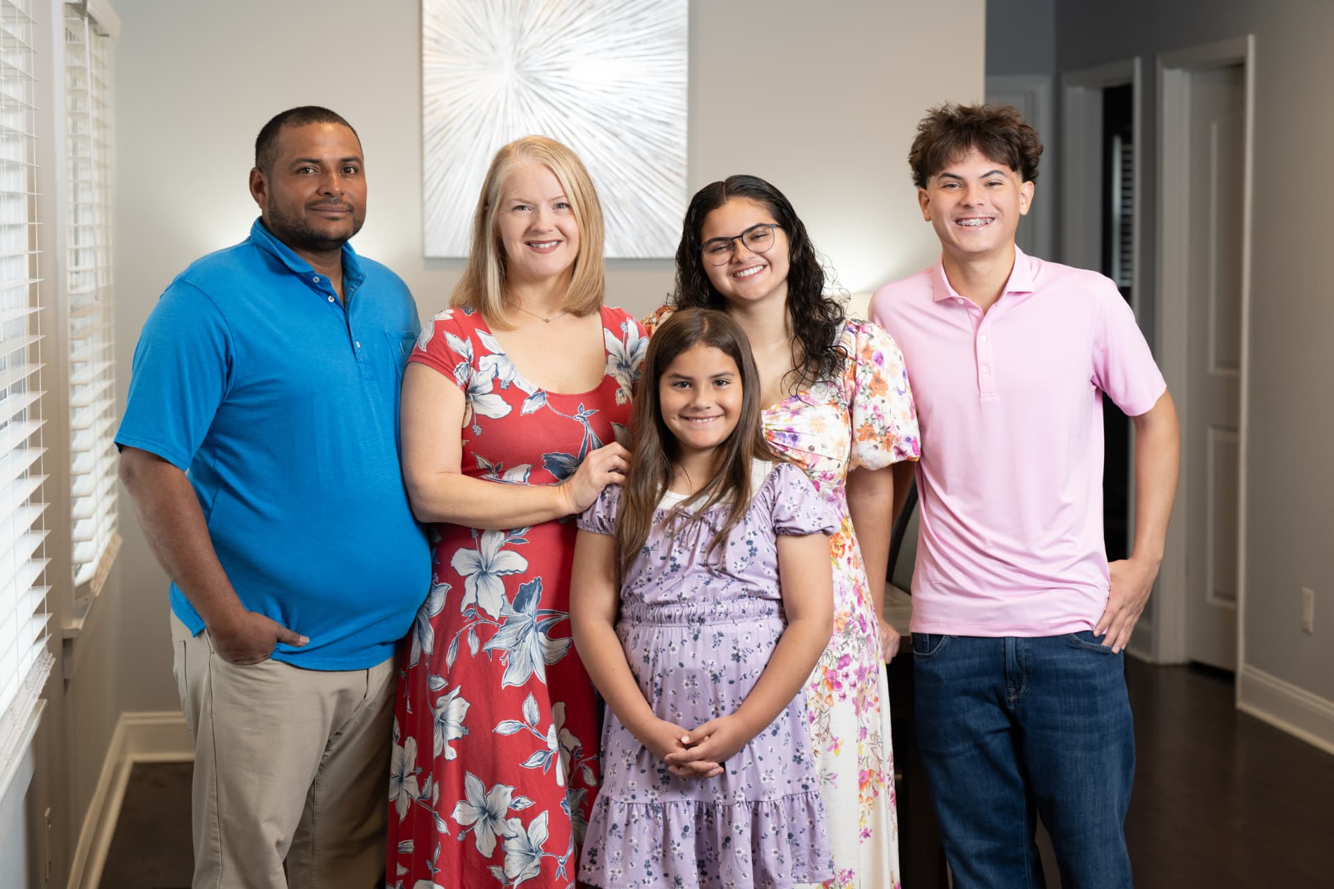 Carlos and Esther with their family, owners of family-owned Timberman Tree Service in Zebulon, NC