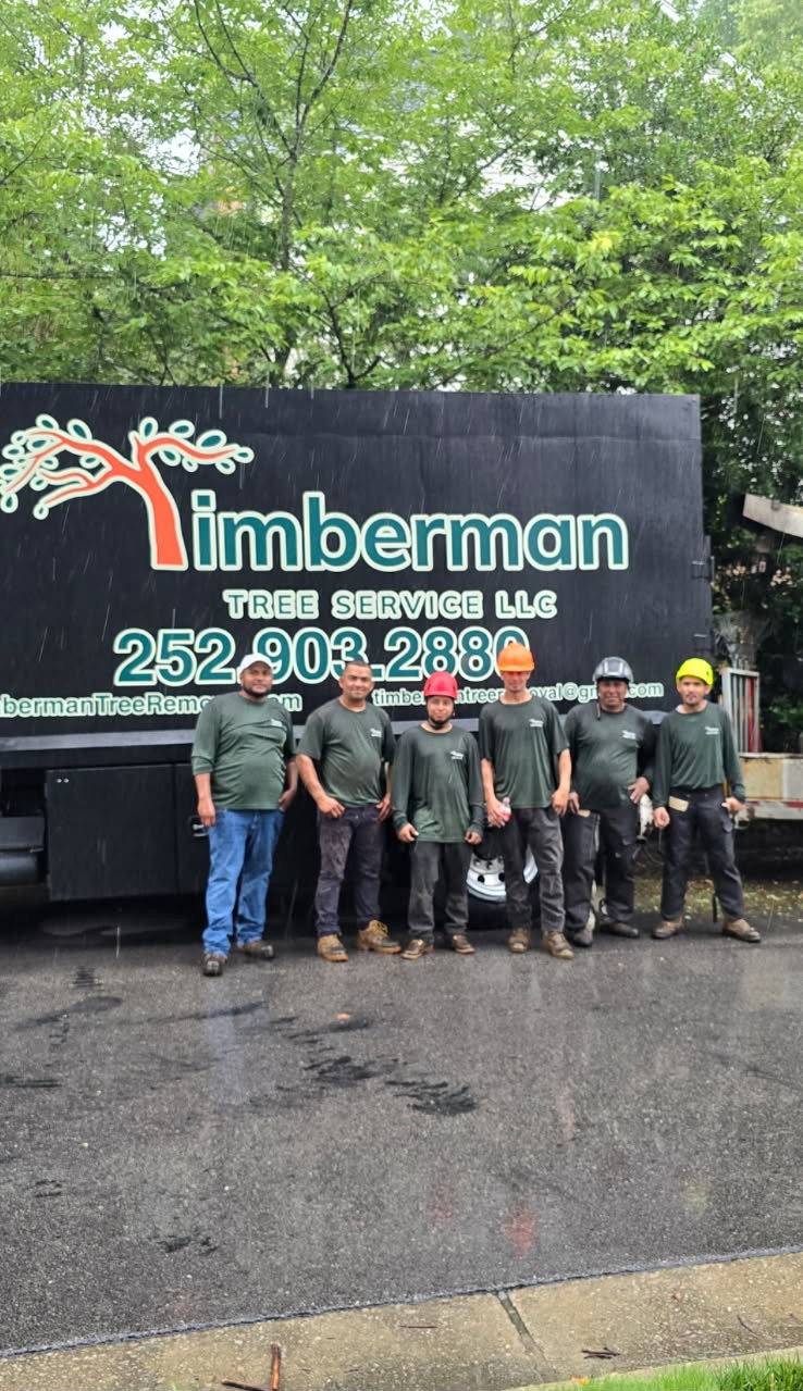 Timberman Tree Service crew in front of the company truck in Zebulon, NC